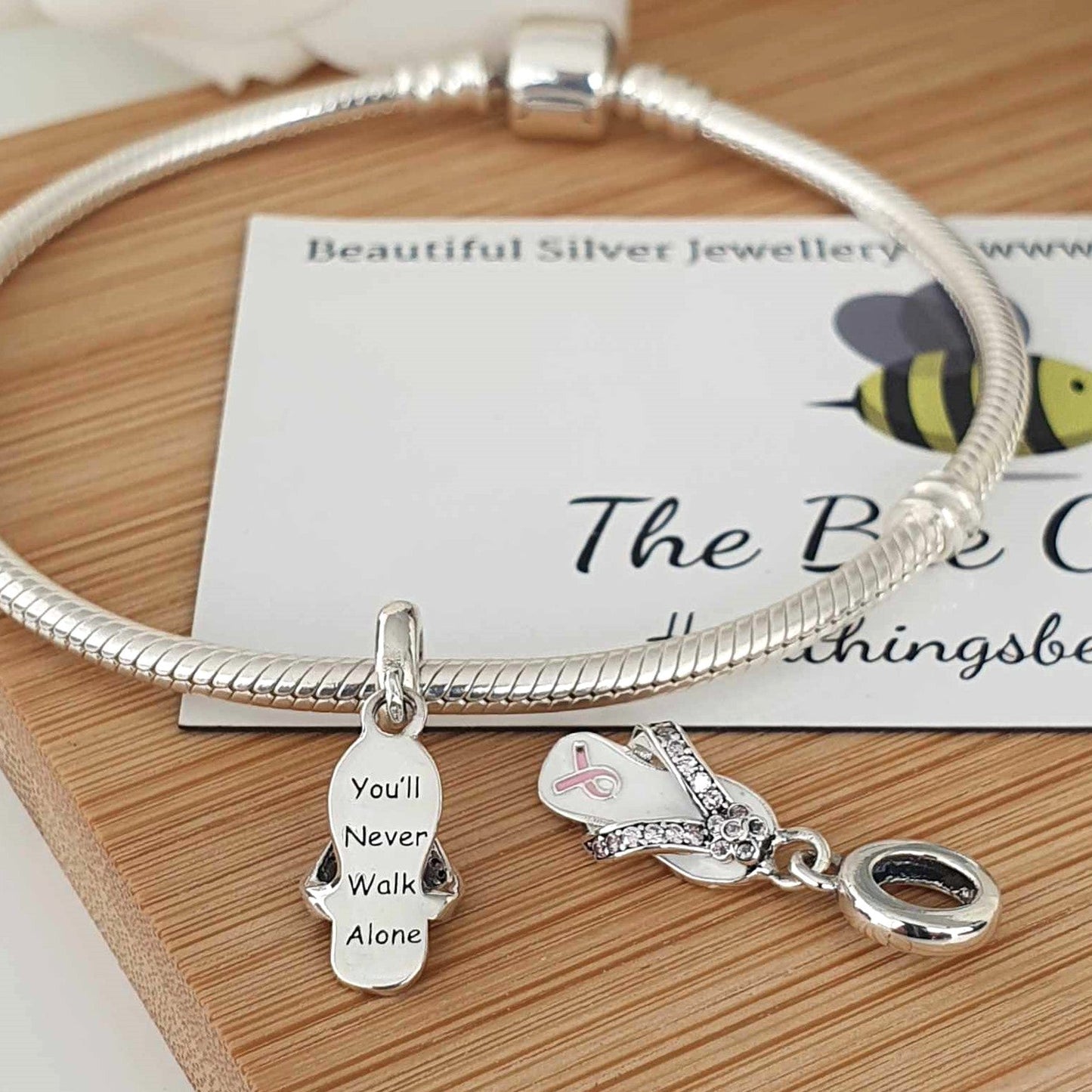 Never Walk Alone Charm (Cancer Support Ribbon) - The Bee Charm