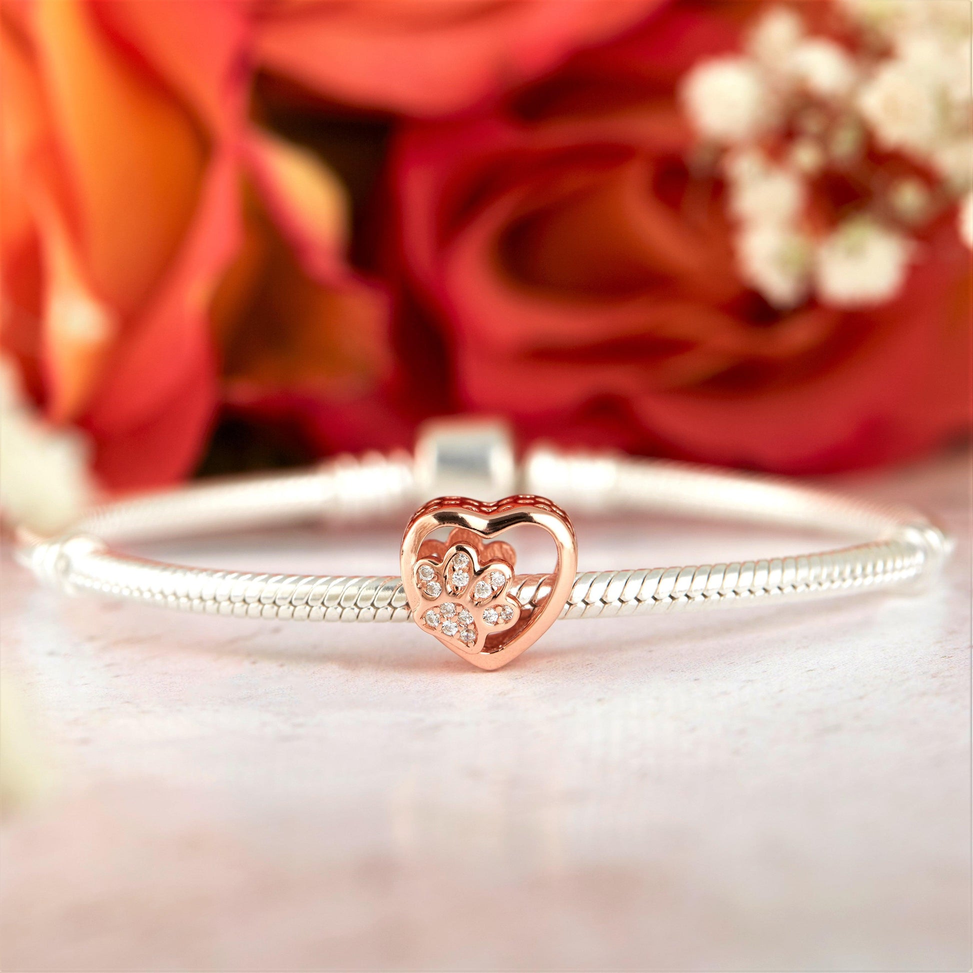 Paw Charm - 925 Sterling Silver with rose gold plating & Cubic Zircons, this super cute heart charm with a paw at its center.